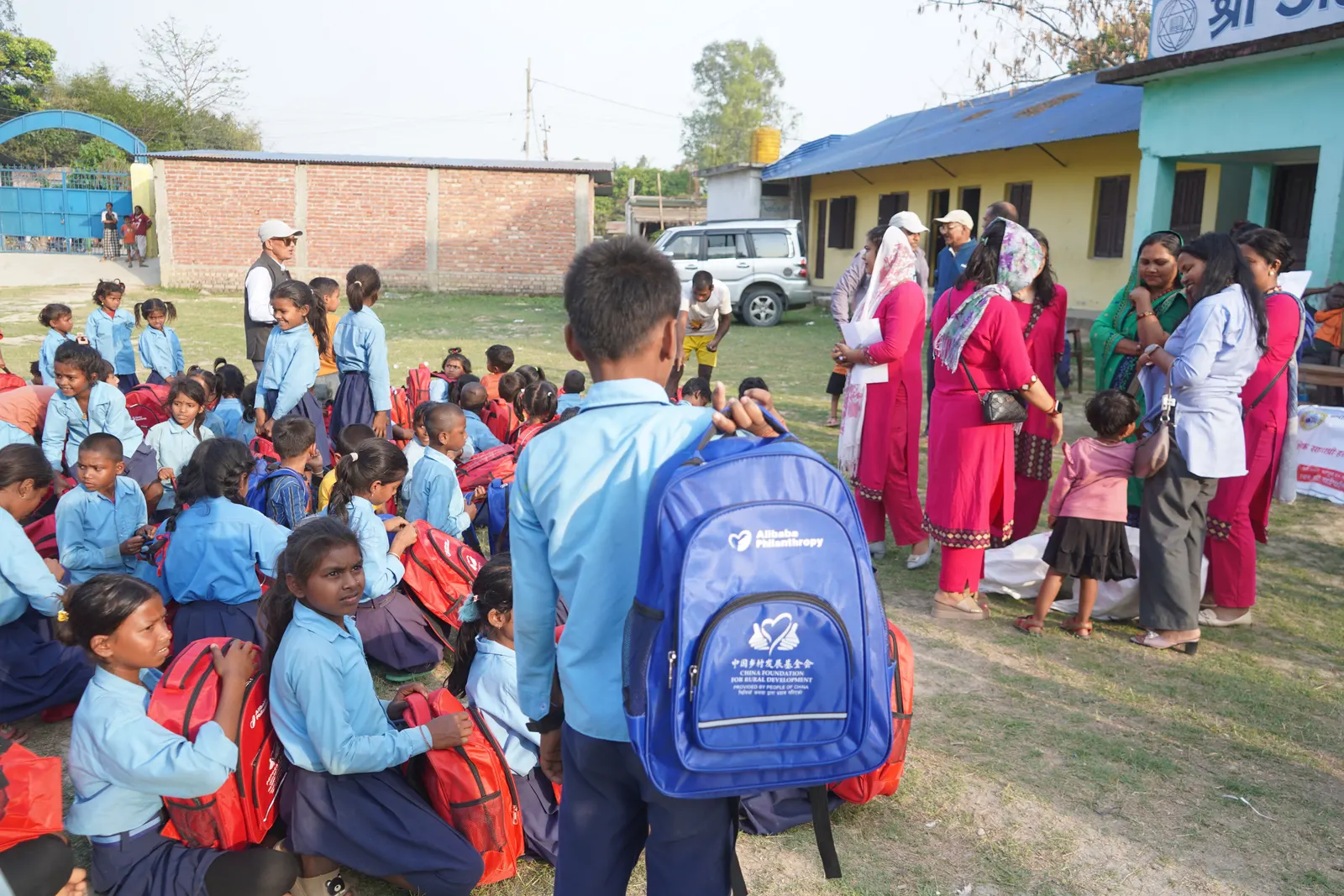 The Forum for Rural Women Ardency Development (FORWARD), in collaboration with the China Foundation and New Light Foundation, distributed school bags, stationery, colouring materials, and hygiene kits to students. 19